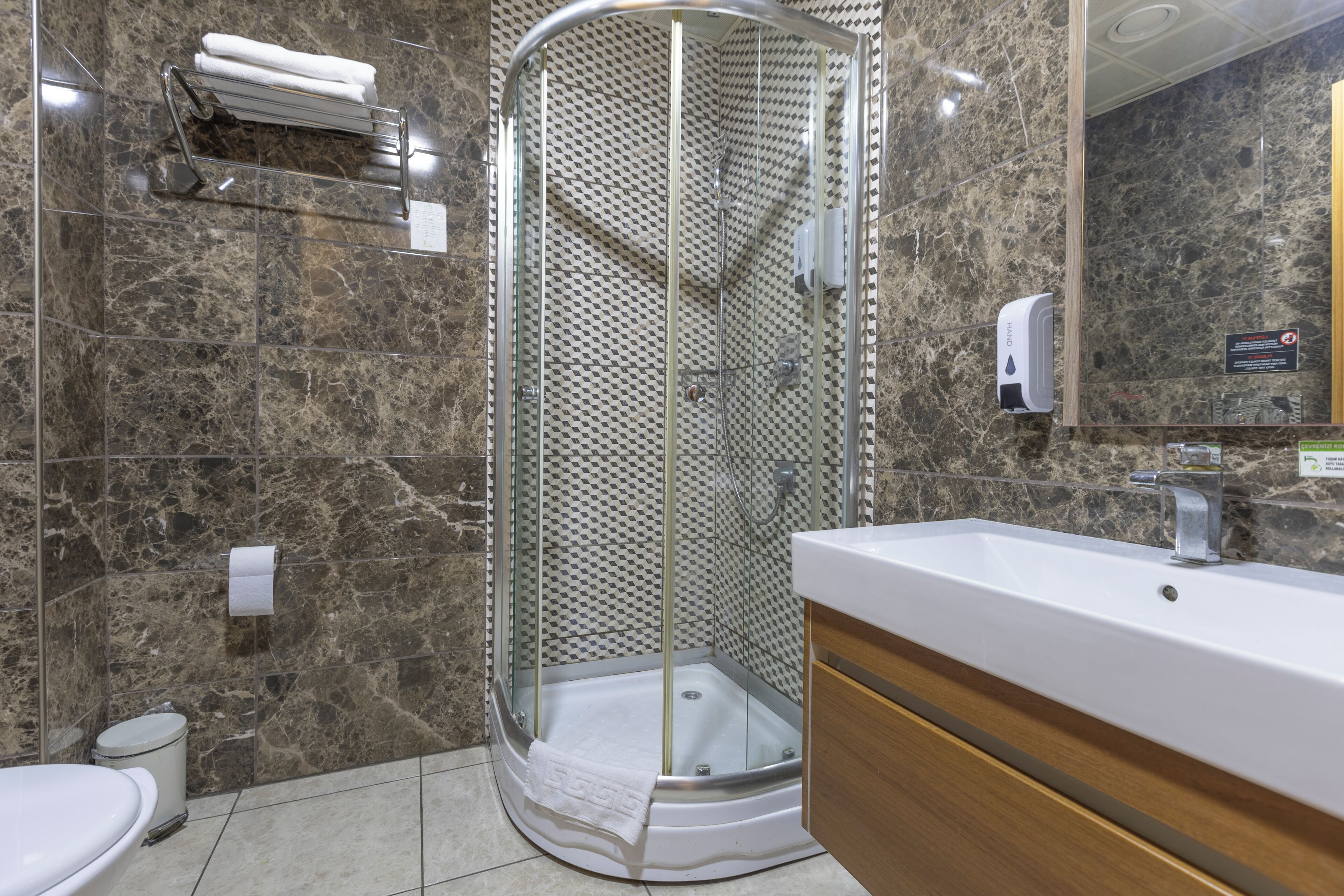 Shower, free toiletries, hair dryer, slippers