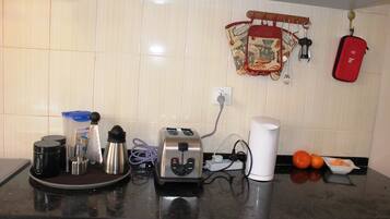 Apartment, 2 Bedrooms | Private kitchen | Full-size fridge, microwave, oven, stovetop