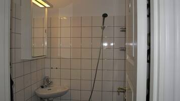 Shower, free toiletries, slippers, towels