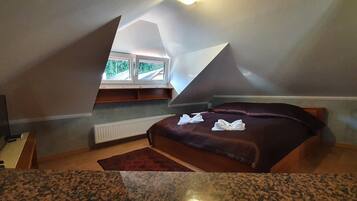 Departamento | Minibar, caja de seguridad en la habitación y cortinas blackout