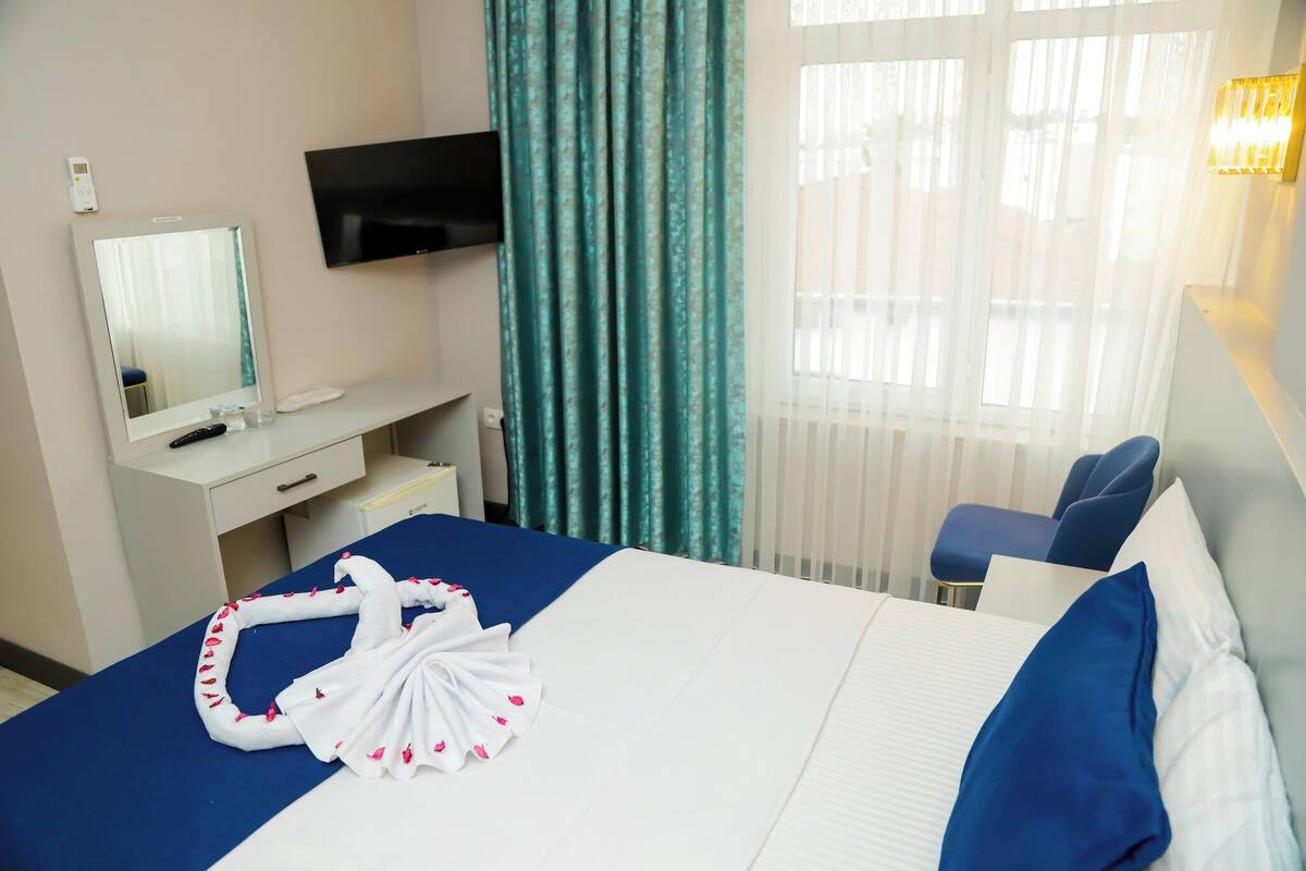 Premium bedding, minibar, desk, laptop workspace