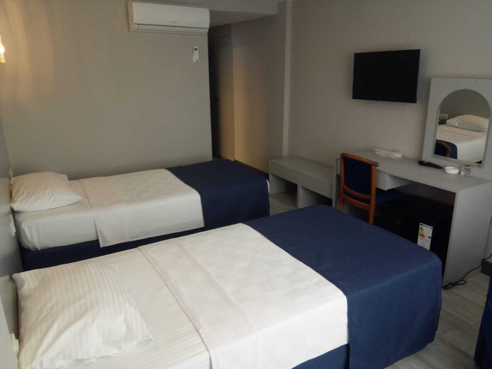 Ropa de cama de alta calidad, minibar y escritorio 