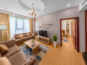 Deluxe-Apartment, 1 Schlafzimmer | Wohnbereich