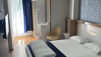Standard Double or Twin Room | In-room safe, desk, laptop workspace, iron/ironing board