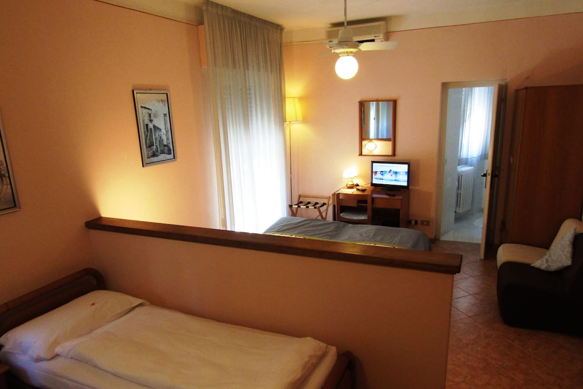 Triple Room, Balcony | In-room safe, desk, cribs (surcharge), WiFi (free)