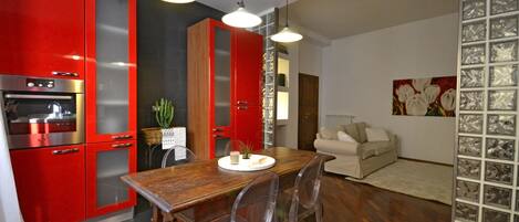 Apartment, 3 Bedrooms | Living area | Flat-screen TV