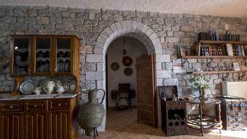 Superior Villa, 2 Bedrooms, Sea View | Living area | 40-inch flat-screen TV with cable channels, TV, fireplace