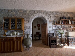 Superior Villa, 2 Bedrooms, Sea View | Living area | 40-inch flat-screen TV with cable channels, TV, fireplace - Sofia Mina Green Villa (East Mani)