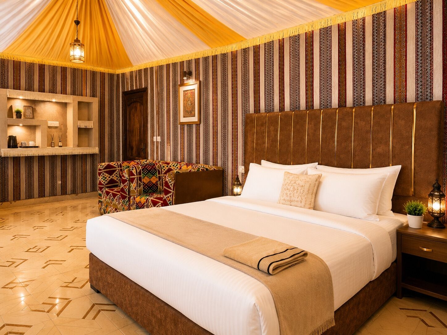 A hotel room with a large bed, a sofa, a wooden headboard, a wall with vertical stripes, and a ceiling with a draped fabric.