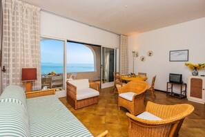 Apartment, 1 Bedroom | Living area | Flat-screen TV