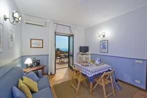 Appartement, 1 chambre | Coin séjour