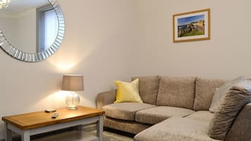 Luxury Apartment, 2 Bedrooms | Living area | 35-inch TV with cable channels