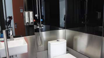 Shower, free toiletries, hair dryer, slippers