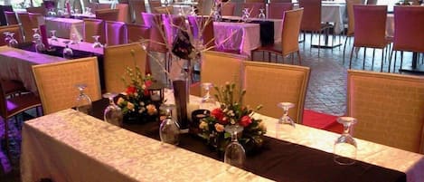 Breakfast, lunch served; local and international cuisine, pool views