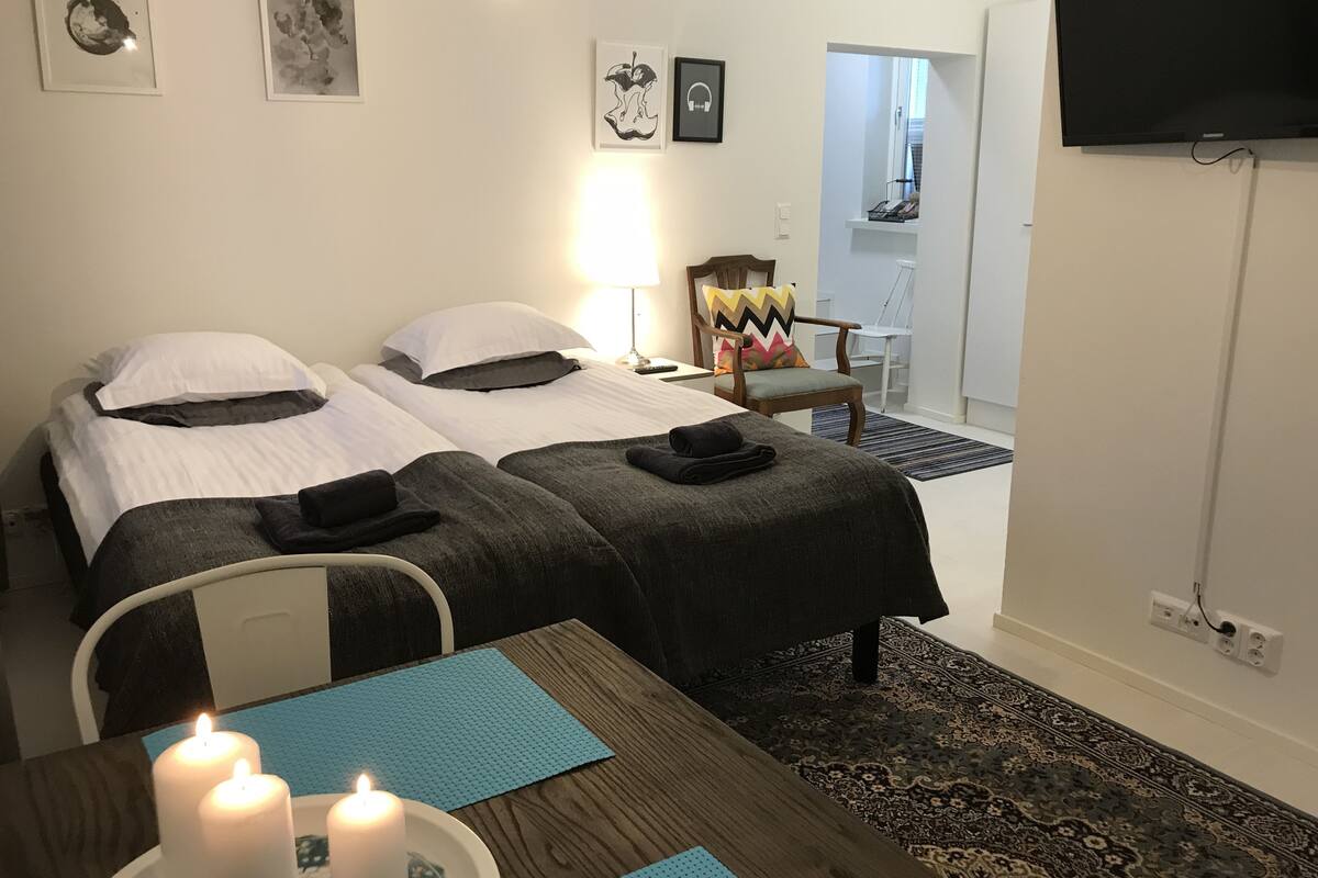 superior apartment | living room | flat-screen tv