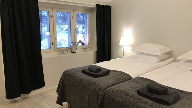 Leilighet – deluxe | Oppholdsområde | Flatskjerm-TV