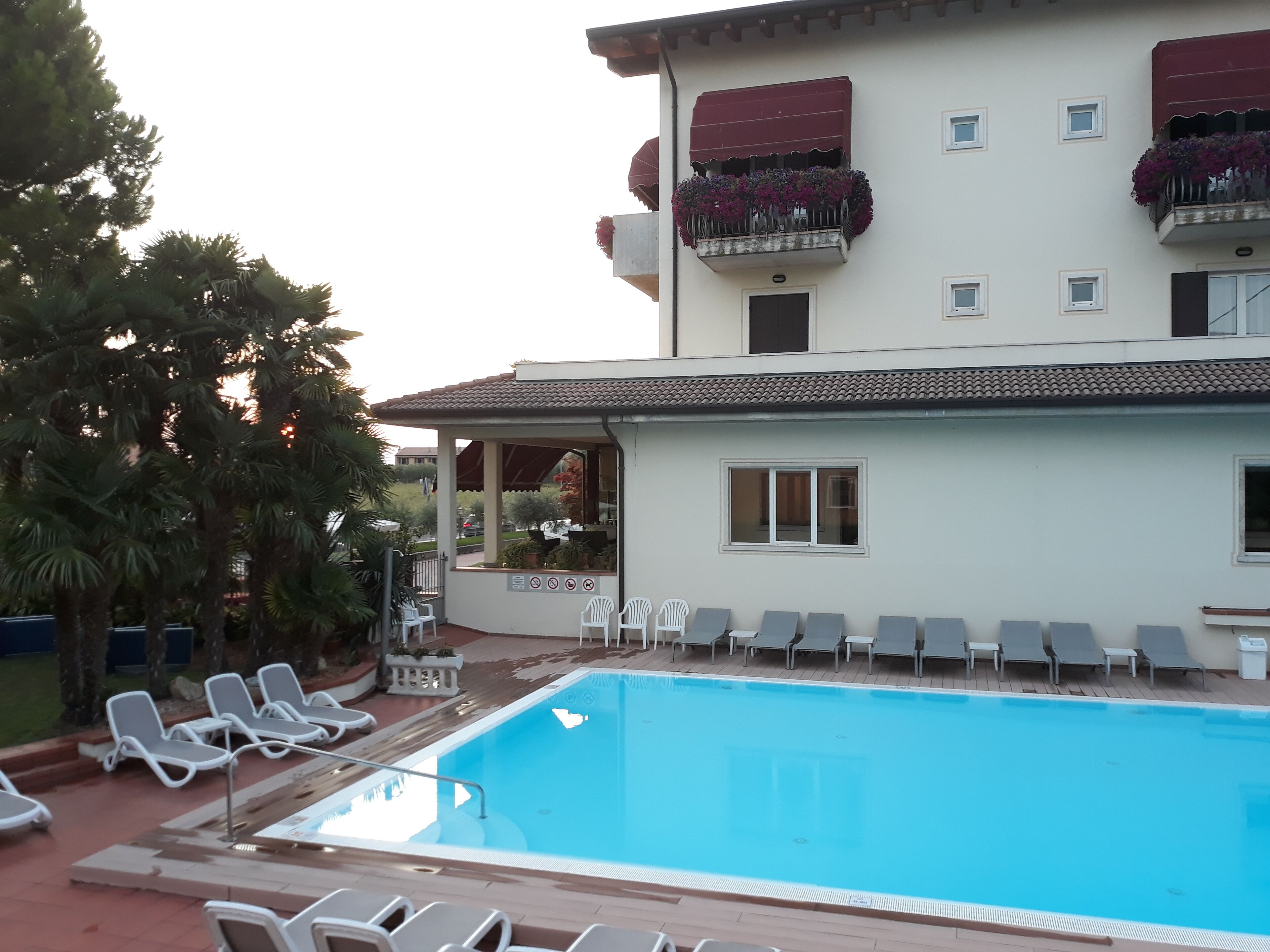 seasonal outdoor pool, open 10:00 am to 7:00 pm, pool loungers