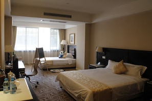 Family Triple Room | Minibar, desk, blackout drapes, free WiFi