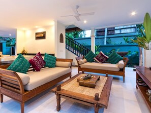 Family Villa | Living area | 32-inch Smart TV with cable channels, DVD player - Villa Gils by Villa Finder (Manggis)