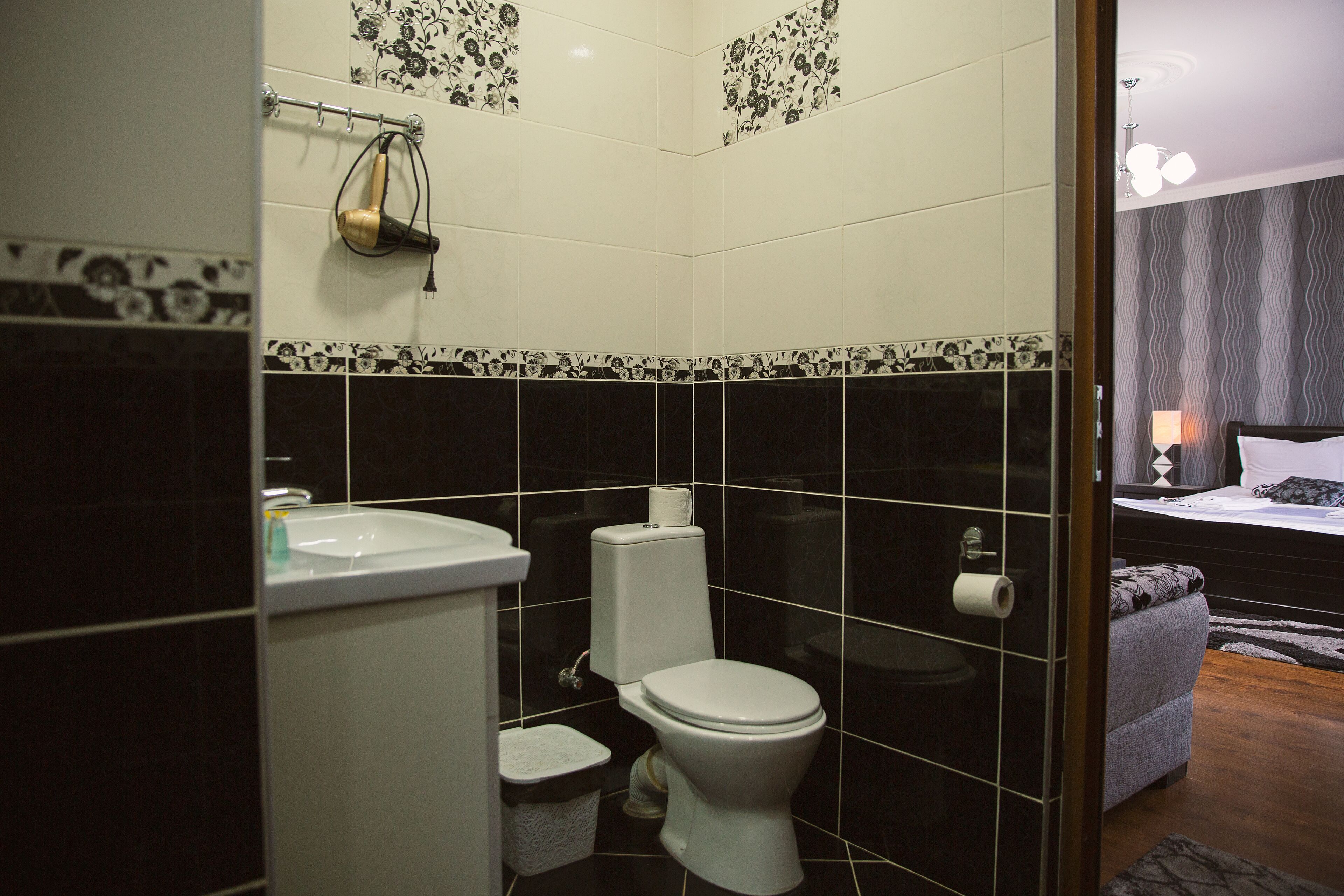 Shower, rainfall showerhead, designer toiletries, hair dryer