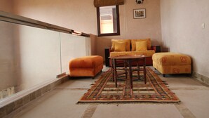Villa | Living area | 42-inch flat-screen TV with cable channels, TV - La Rose De L'Atlas (Marrakech)