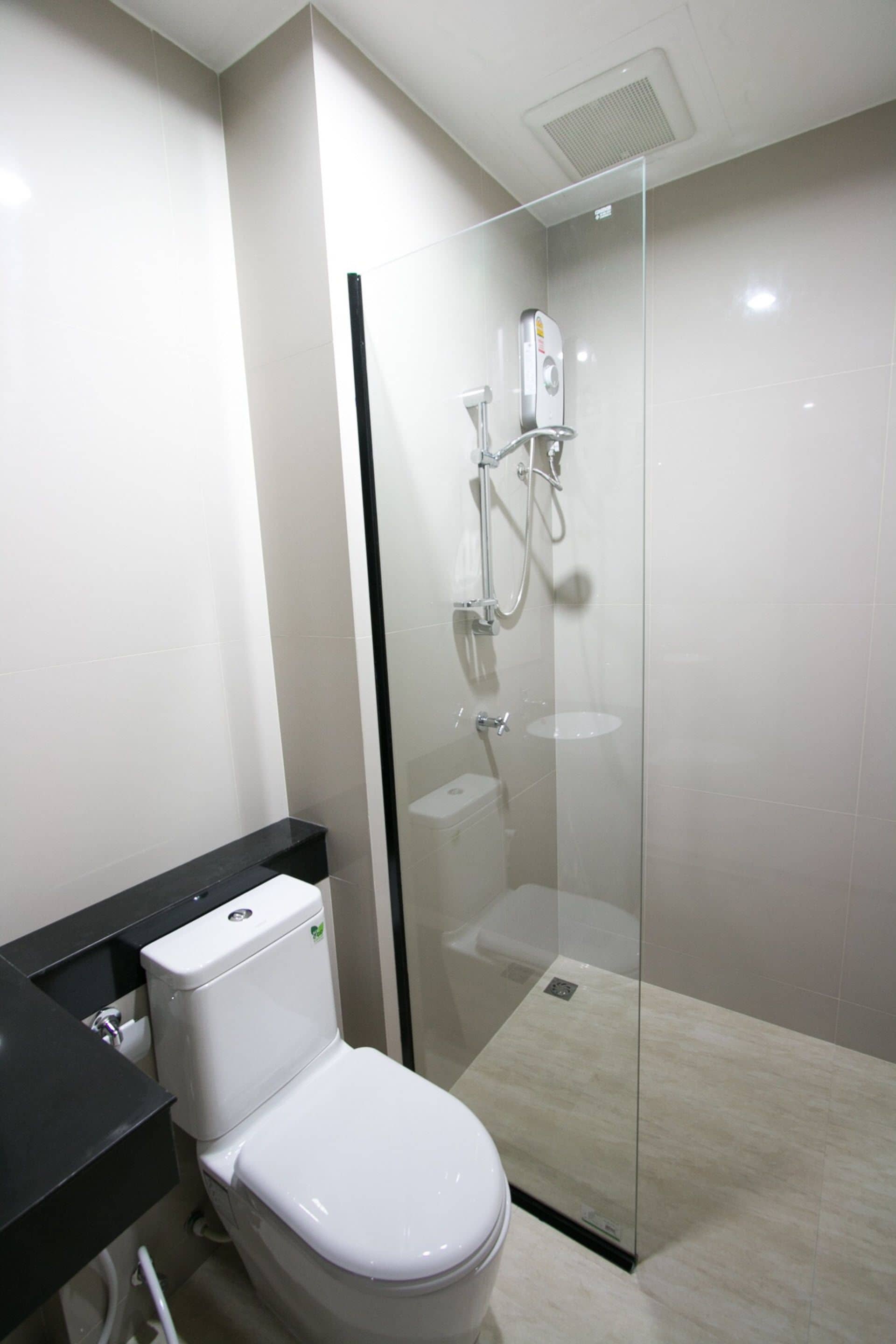 superior twin room | bathroom | shower, free toiletries, hair dryer, slippers