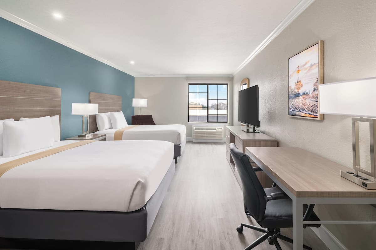 Deluxe Room, 2 Queen Beds, Non Smoking | Premium bedding, in-room safe, desk, laptop workspace