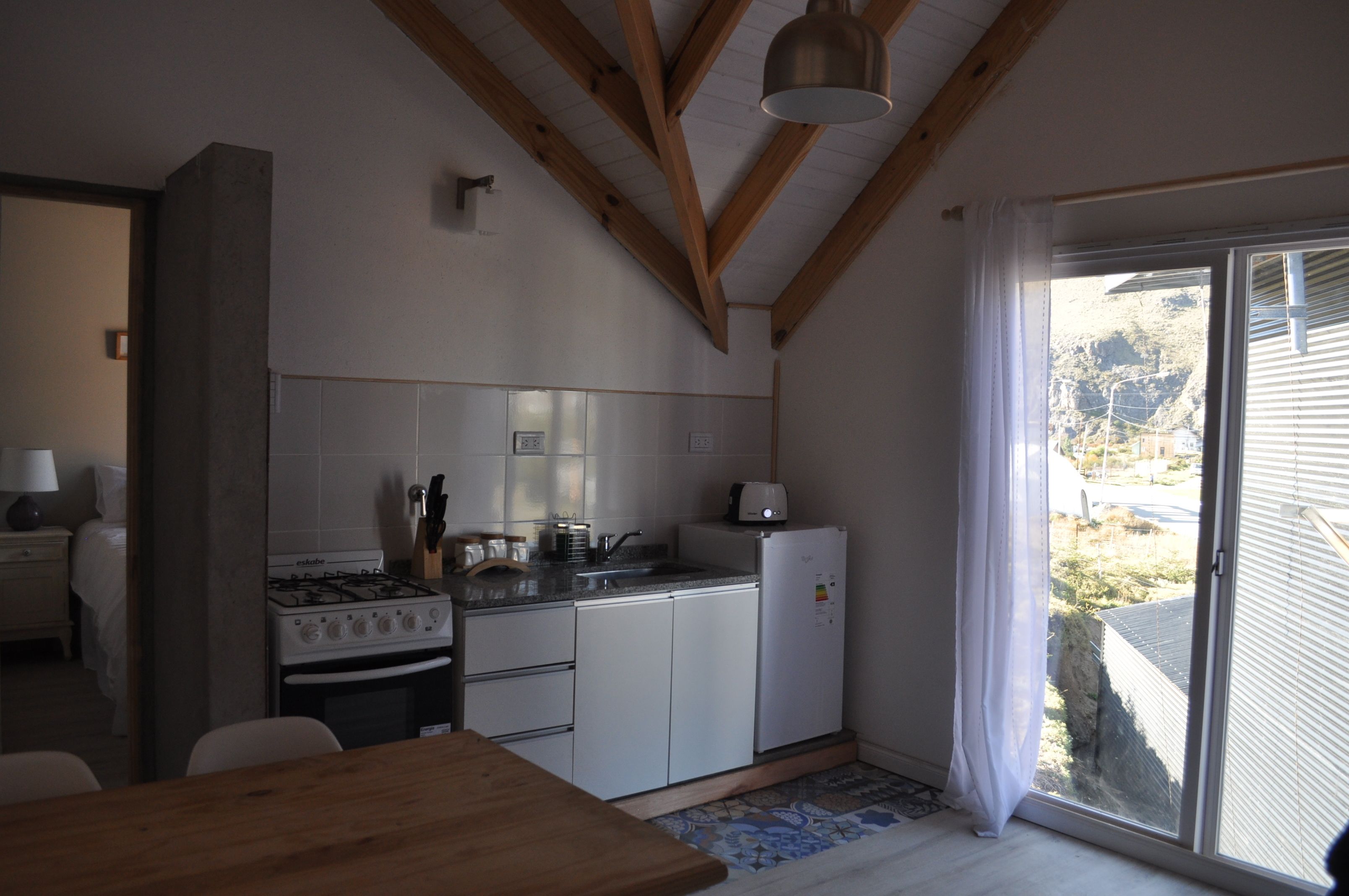 full-sized fridge, microwave, toaster, cookware/dishes/utensils