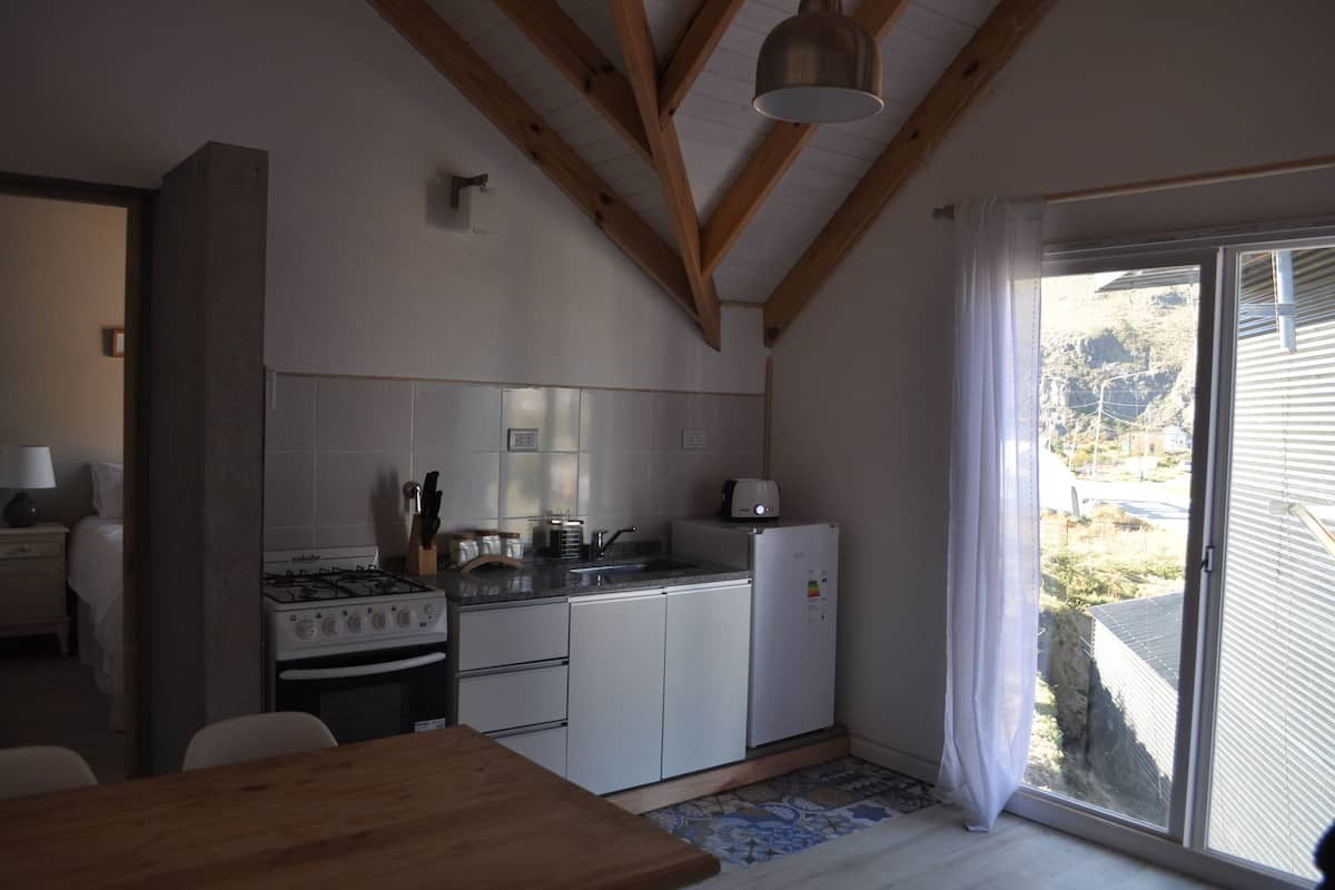 full-sized fridge, microwave, toaster, cookware/dishes/utensils