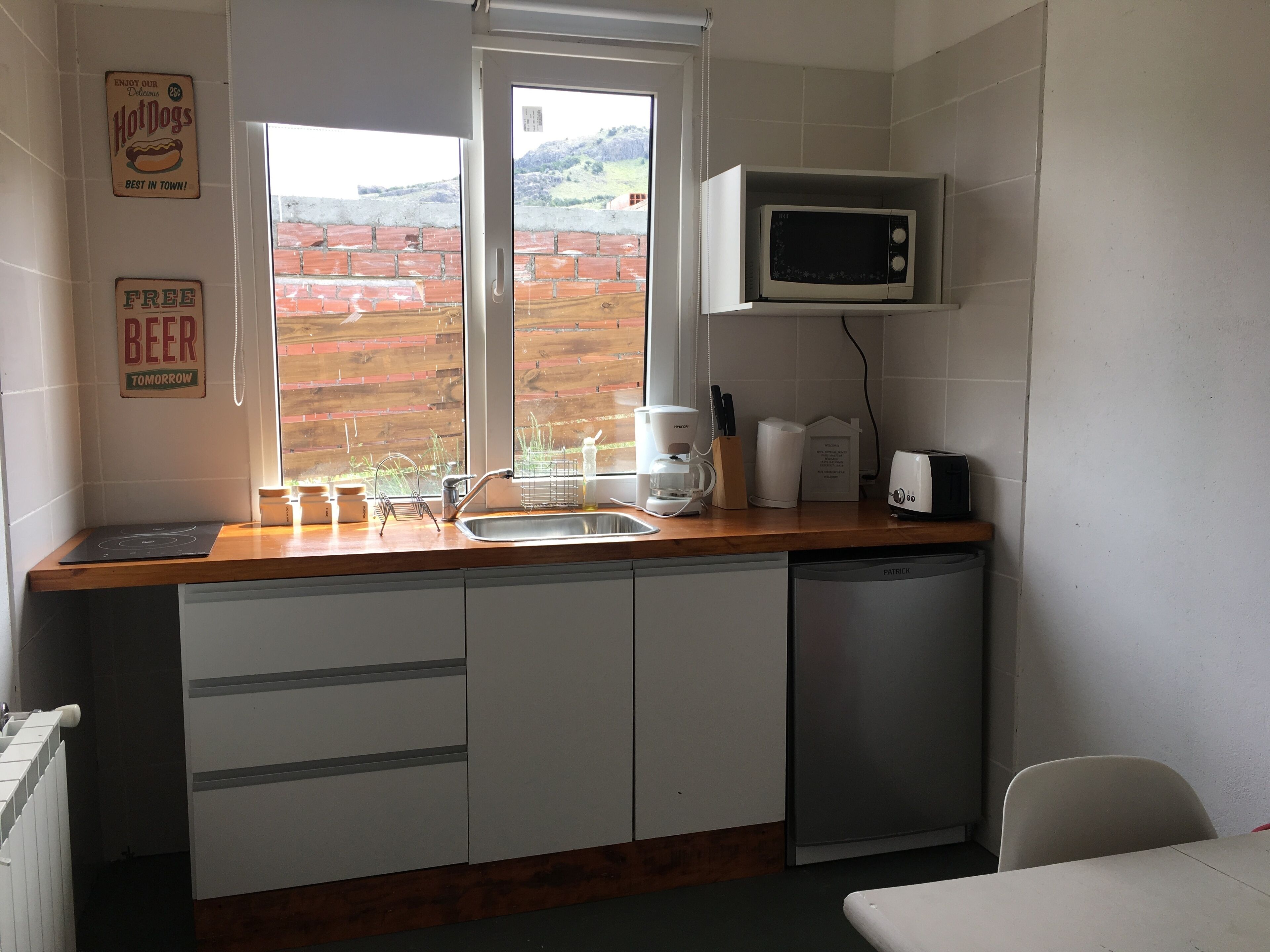 economy apartment, 1 bedroom | private kitchen | full-sized fridge, microwave, toaster, cookware/dishes/utensils