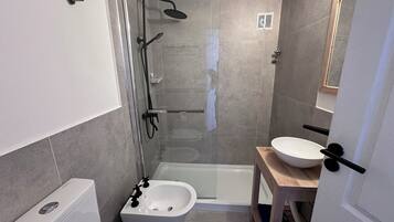 Traditional Apartment, 1 Bedroom | Bathroom | Combined shower/tub, deep soaking tub, free toiletries, hair dryer