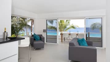 Luxury Apartment, 1 Bedroom, Kitchen, Ocean View | Living room | Flat-screen TV