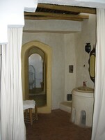 Double Room (Paille) | Bathroom | Shower, rainfall showerhead, hair dryer, towels