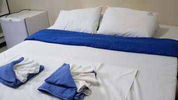Quarto casal ou duplo | Frigobar, Wi-Fi de cortesia, roupa de cama
