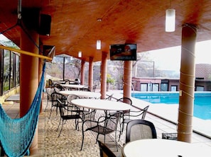 Outdoor pool, open noon to 6 PM, pool loungers
