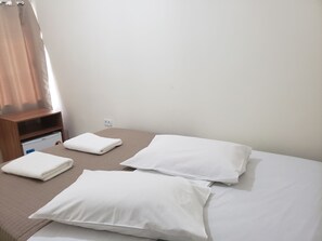 Quarto casal | Cortinas blackout, ferros/tábuas de passar roupa, Wi-Fi de cortesia