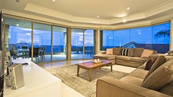 Luxury Apartment, 3 Bedrooms, Ocean View | Living area | Flat-screen TV