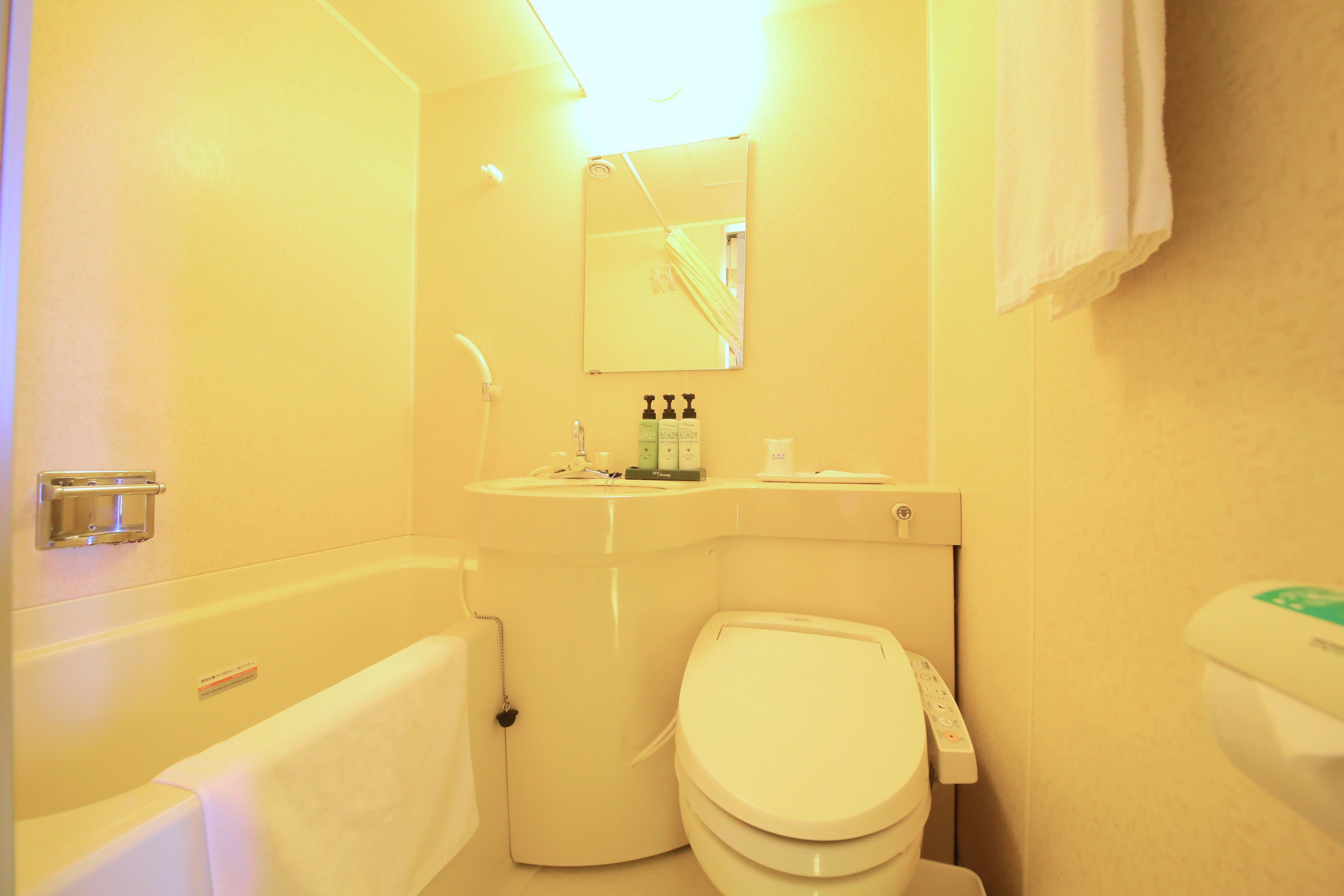 free toiletries, hair dryer, slippers, bidet