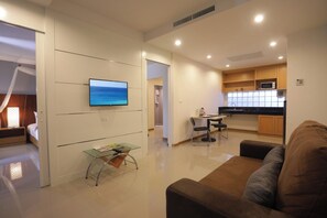 Junior Studio Suite | Living area | 32-inch LCD TV with cable channels - Impress Resort (Thep Krasattri)
