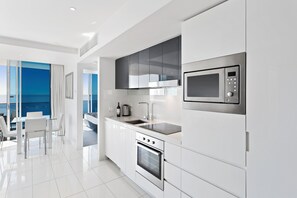 Apartment, 2 Bedrooms, 2 Bathrooms, Ocean View (Level 30) | Private kitchen | Full-sized fridge, microwave, oven, stovetop - Holiday Holiday - H Residence Apartments (Surfers Paradise)
