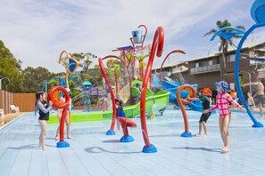 A water park with various play structures and a swimming pool. - Tasman Holiday Parks - Easts Beach (Kiama)