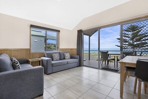 Seabreeze Villa, 2 Bedrooms | Living room | 26-inch flat-screen TV with digital channels, TV, DVD player