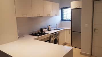 Apartment, 2 Bedrooms | Private kitchen | Full-size fridge, microwave, oven, stovetop