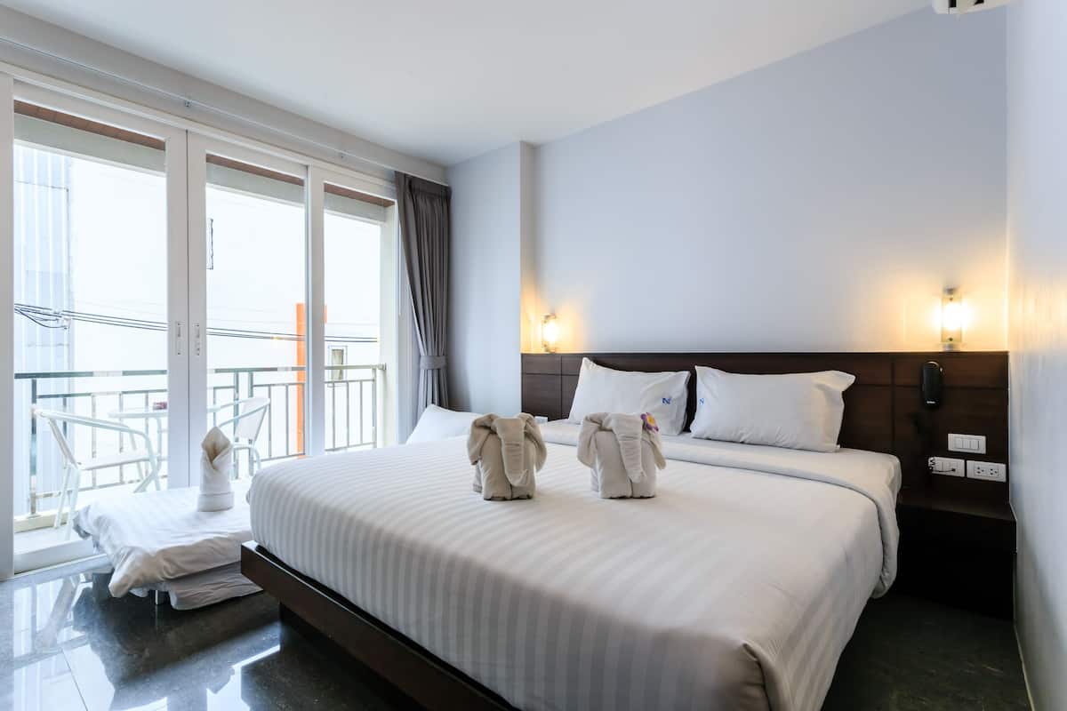 Family Triple Room | Minibar, in-room safe, soundproofing, free WiFi