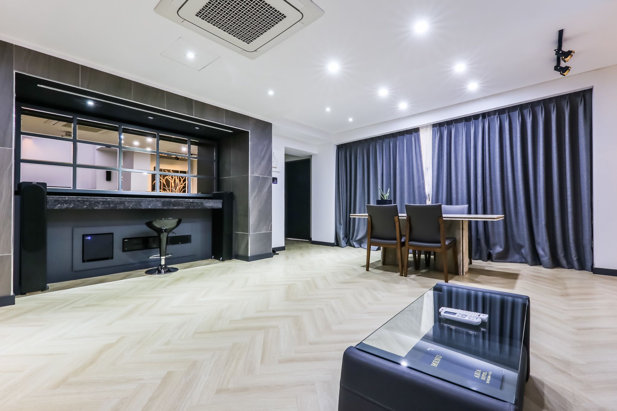 deluxe studio | living area | 65-inch lcd tv with cable channels, smart tv, pay films