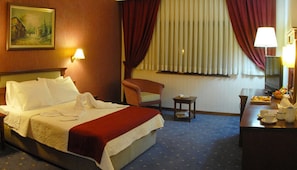 Minibar, desk, iron/ironing board, free cots/infant beds