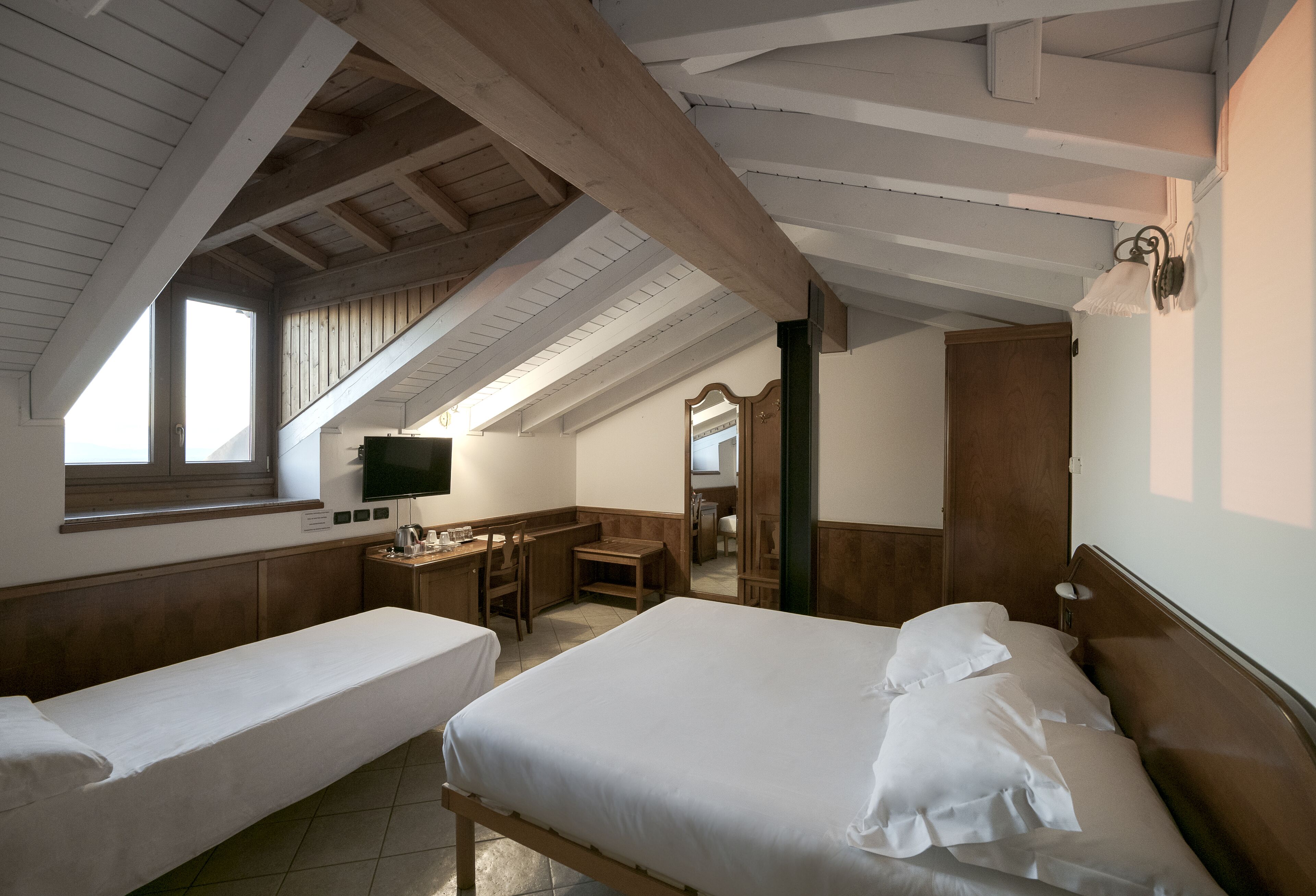 superior triple room | 1 bedroom, down duvets, memory-foam beds, desk