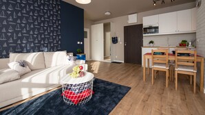 Leilighet – comfort, 1 queensize-seng, ikke-røyk | Oppholdsområde