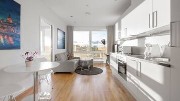 Comfort Apartment | Private kitchen | Fridge, microwave, oven, stovetop