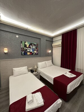 Family Room | Premium bedding, in-room safe, desk, free cribs/infant beds - Ferah Hotel (Arakli)